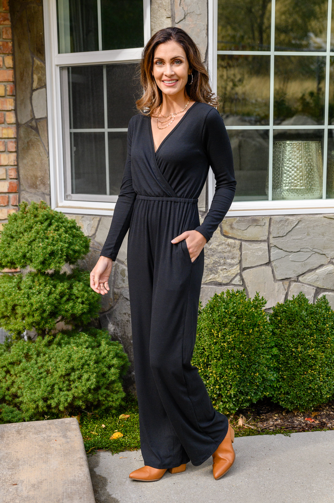 Onward & Upward Faux Wrap Jumpsuit In Black